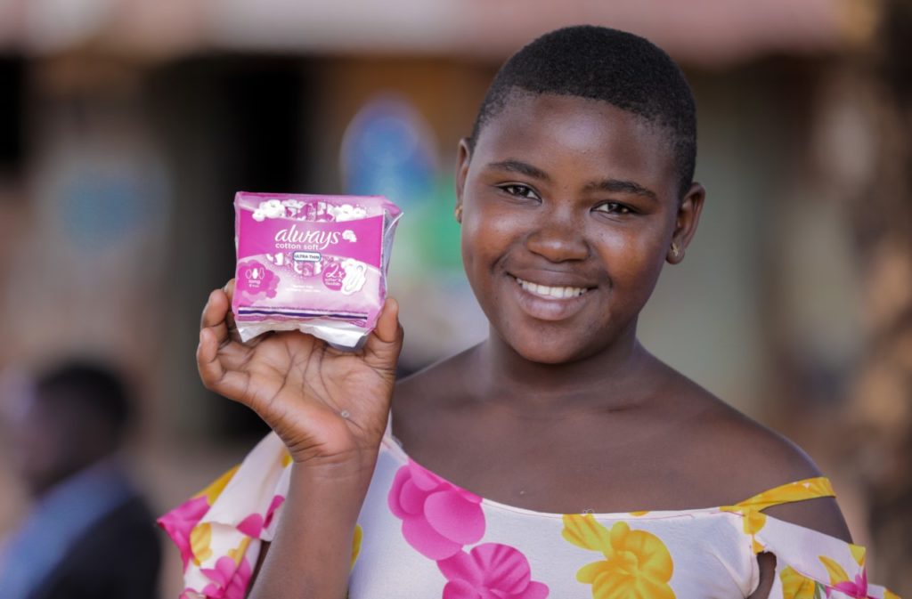Girl holding sanitary napkins