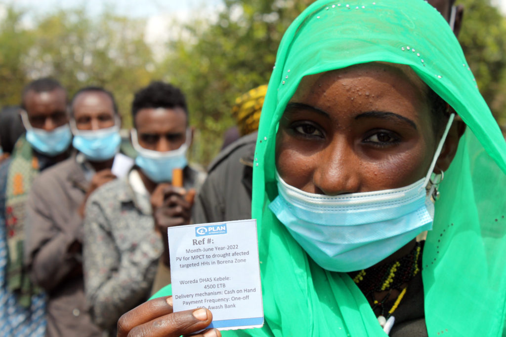 Gnuke and her voucher from Plan International