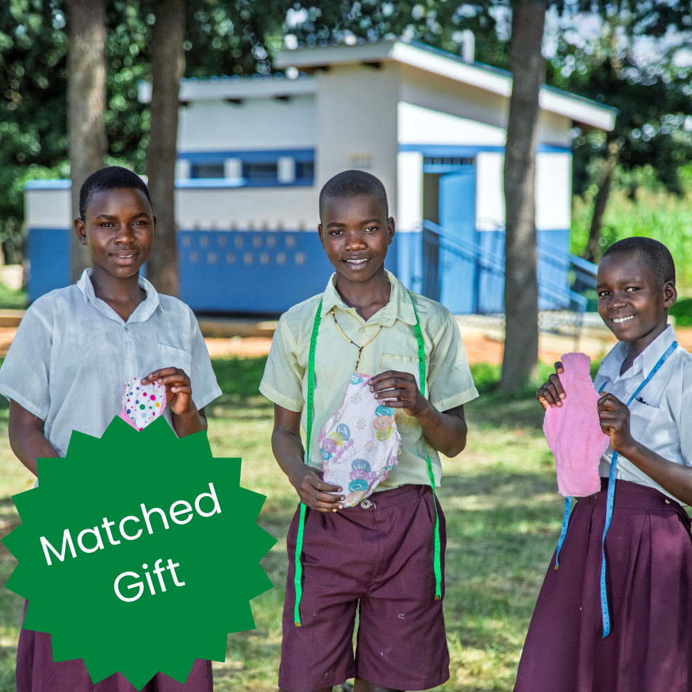 Children from a school in Uganda hold period pads they've sewn